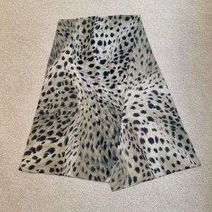 Cotton/rayon leopard scarf.